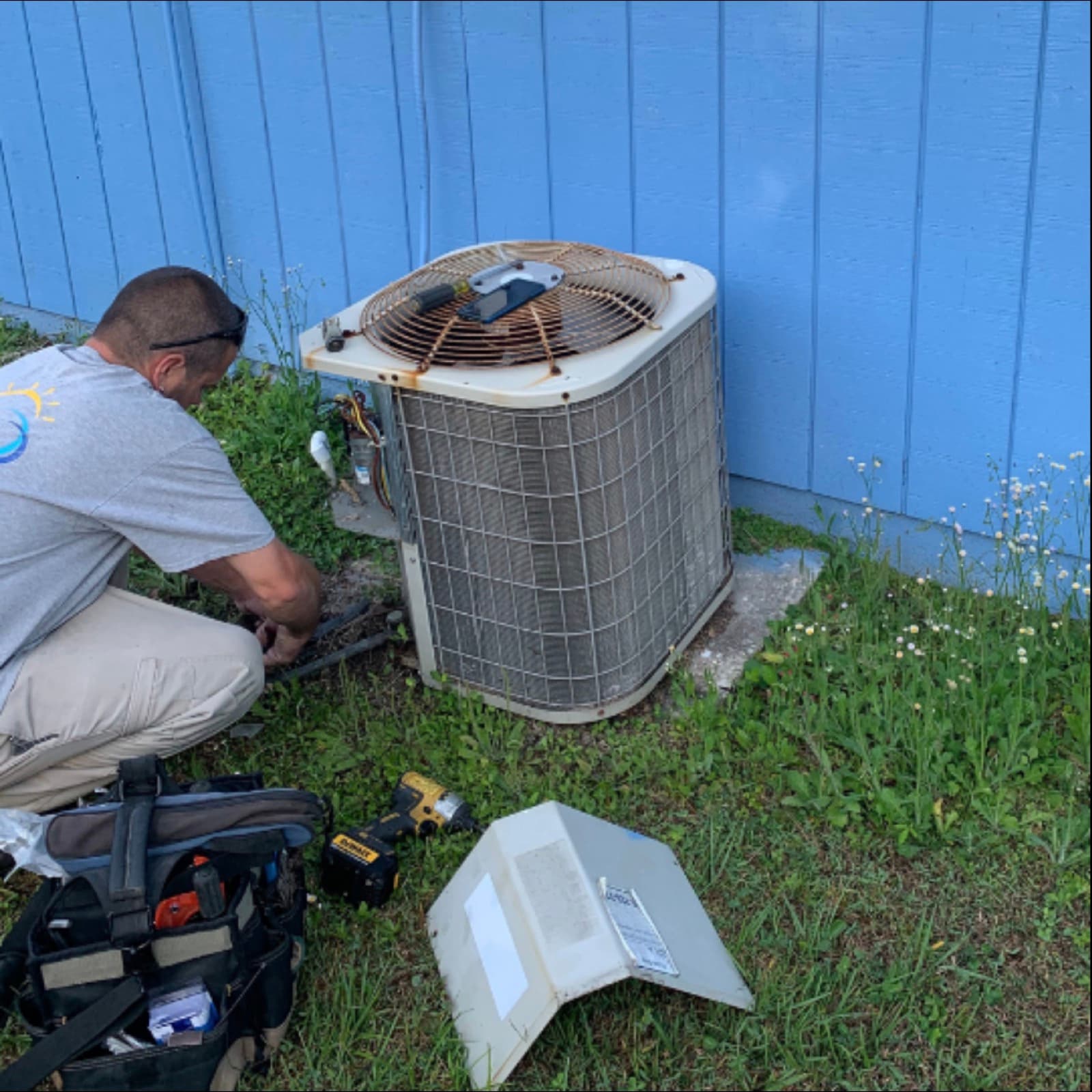Fresh Air & Heat technician on a service call